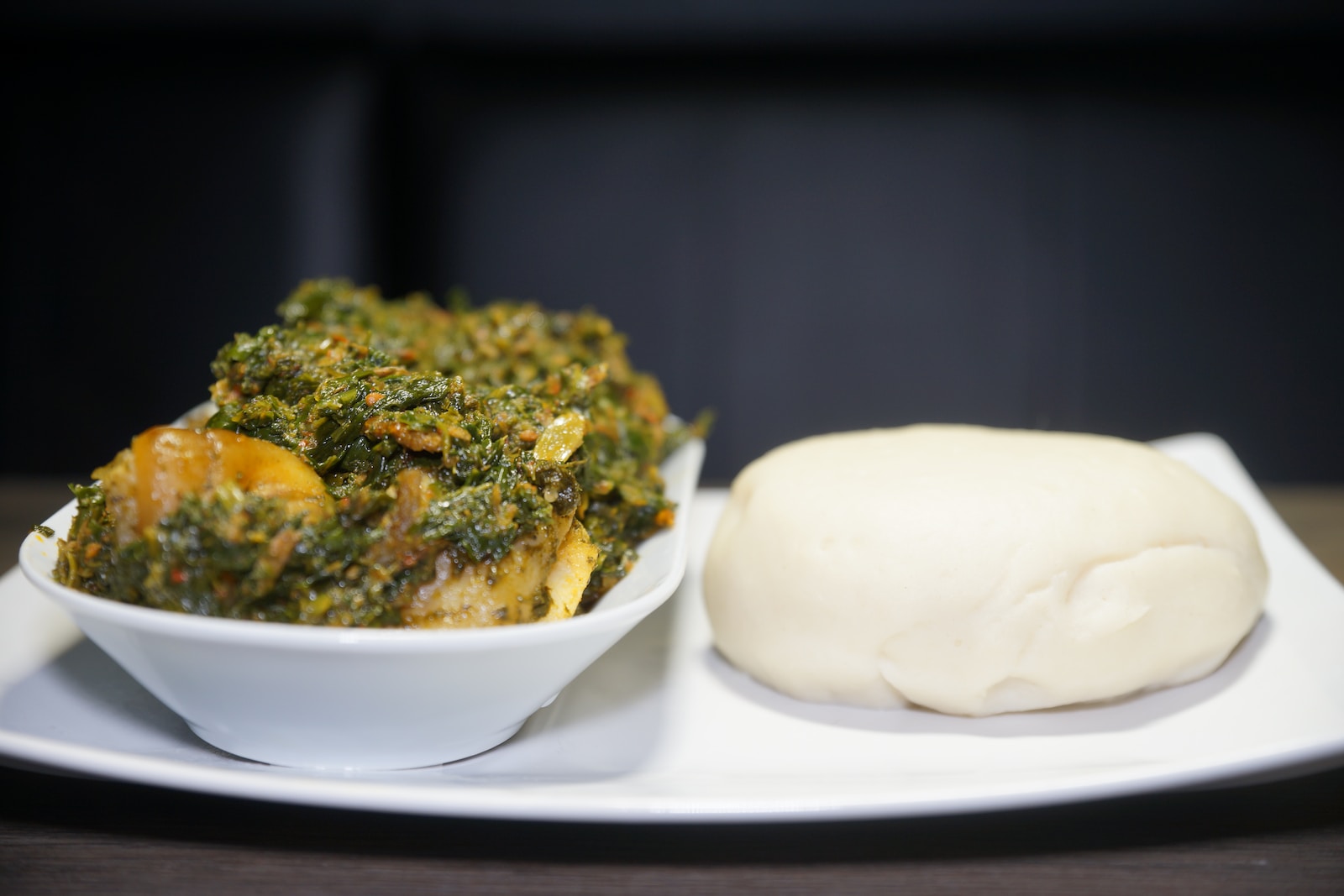 white ceramic bowl with green vegetable dish